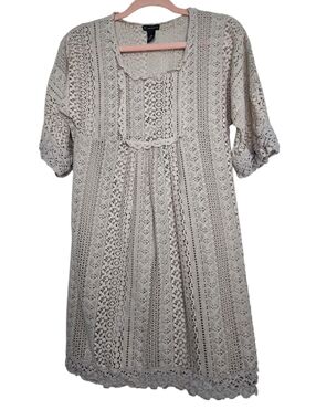 New Directions A-line silhouette with a scoop neckline and 3/4 length sleeve